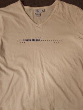 Calvin Klein Jeans Women's Cream Long Sleeve V-Neck Long Sleeve with Navy Logo
